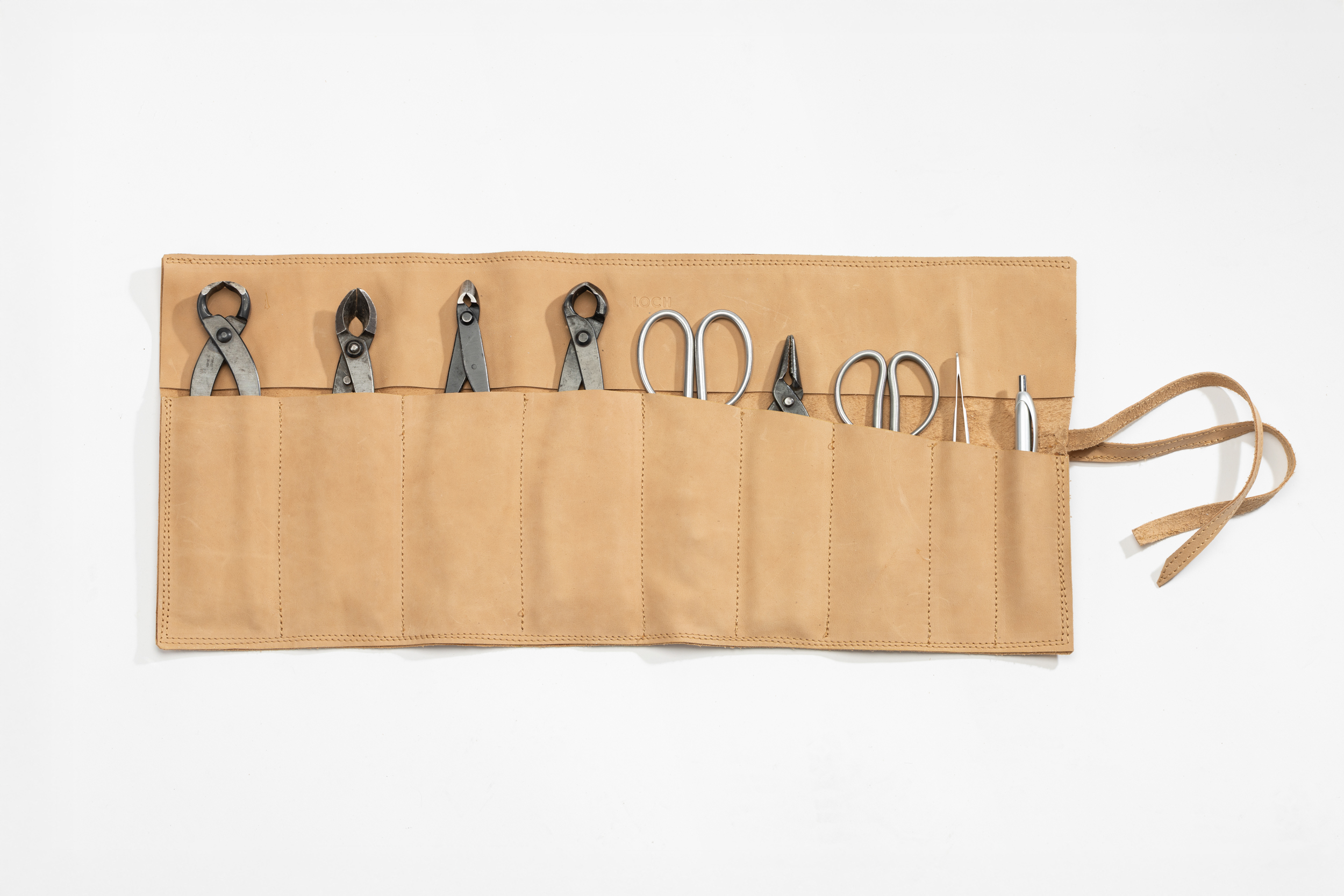 Kožené pouzdro rolovací